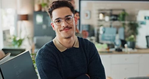 Man, face and confident with arms crossed for coding, programing and system update as software