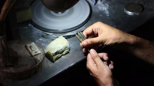 Gem Cutter Polishing Gemstones in Jaipur, India