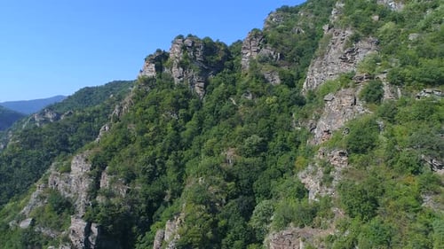 Lush Green Mountainside Aerial View