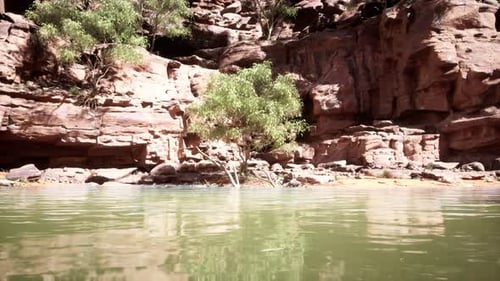 Beautiful Day on the River with Sandstone Cliffs and Reflections