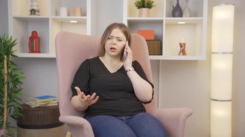 Frustrated Woman Arguing on Phone Call in Chair