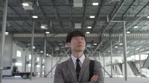 Portrait Confident Male Property Owner in Large Warehouse Adult