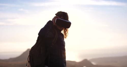 Young Adult Using VR Headset in Nature