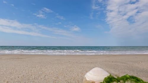 Relaxing background theme - wave a coming into the camera directing on a low position on a summer
