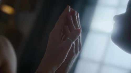 Hands of Couple Holding Intimately in Close Up