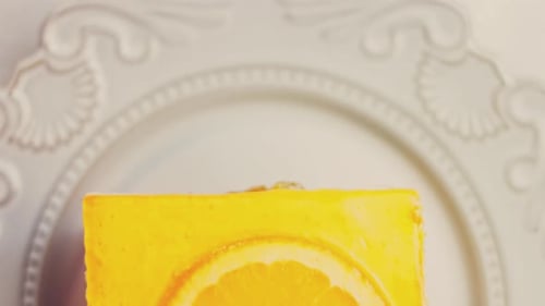 Waviness Effect of A Piece of Tangerine Cake with Jelly