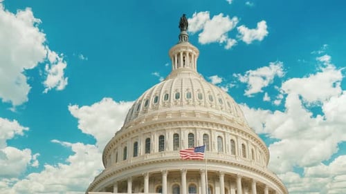Dome of the Capitol Building in Washington DC Clouds are Swiftly Floating on the Building Timelapse
