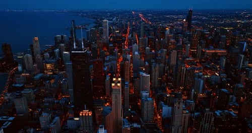 Lively energetic lifestyle of a big city in the evening. Scenic view on the downtown of Chicago