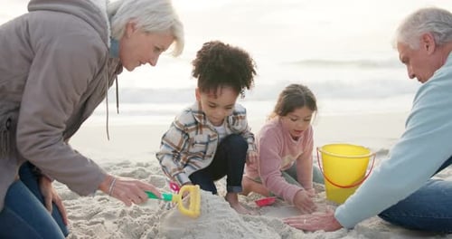 Children, playing and sand with grandparent at beach for fun on holiday in summer for weekend