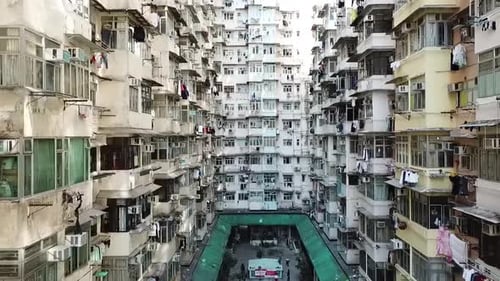 Courtyard Surrounded by Multiple Story High-Rise Apartments in Hong Kong