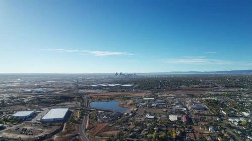 Far away distant drone shot flying towards downtown Denver, Colorado