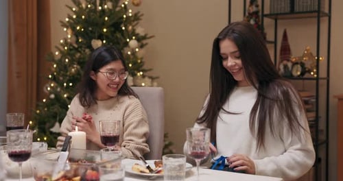 During Party Guy Gives Gift to Girlfriend