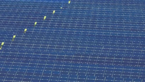 Aerial View of Large Sustainable Electrical Power Plant with Rows of Solar Photovoltaic Panels for