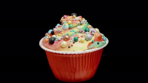 Colorful Cupcake Isolated on Black Background