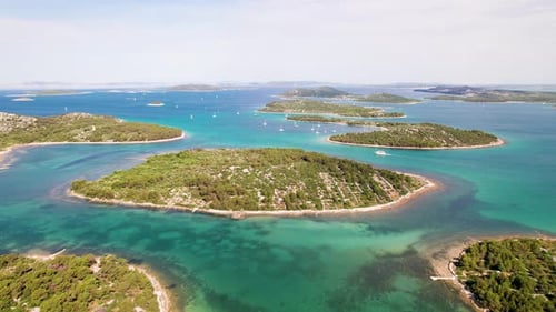 Aerial view of Murtur Island and blue sea, Croatia.
