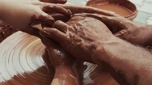 Shaping A Clay Pot In A Ceramics Workshop 50