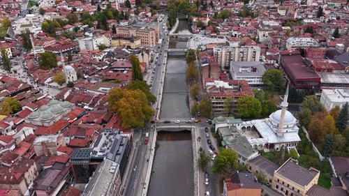 Drone Shot of Sarajevo Bosnia and Herzegovina. Miljacka River and City Center Buildings