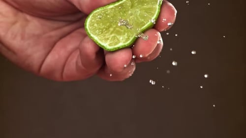 The Chef Squeezes Lime Juice Filmed on a Highspeed Camera at 1000 Fps