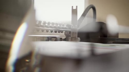 Printer Printing on White Paper in Office