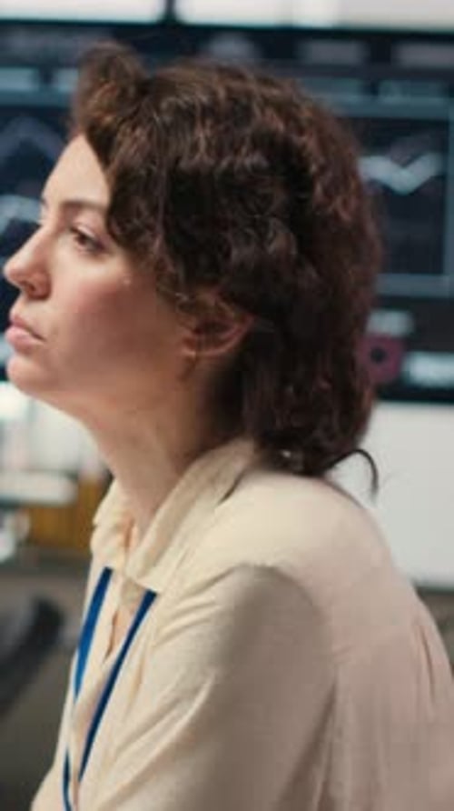 Vertical Video Female Advisor in Workstation Thinking About a New Strategy to Increase Profit