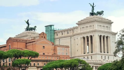 View of the Roman Forum in Rome, Italy. Ancient excavations with Victor Emmanuel II Monument on the