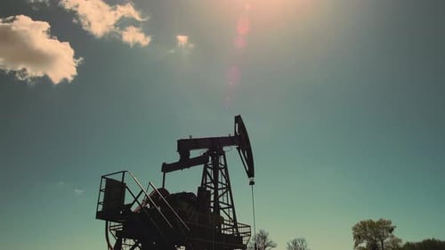 Close-up of working oil pump jack