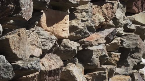 Close up shoot of a stone wall next to the ruins of a medieval village in Madrid, Spain