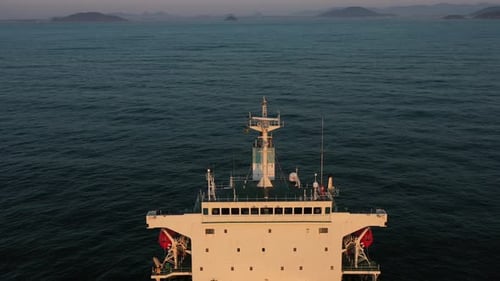 4K(24fps) Fly above panamax size bulk carrier vessel.