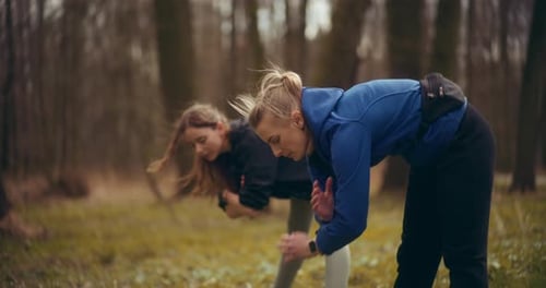 Two Woman Workout Exercising In Park Jogging Fitness