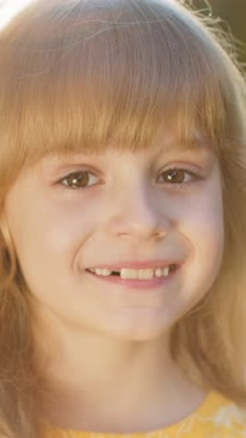 Portrait of Happy Preteen Child Girl Face Smiling Looking at Camera Good Mood Satisfied on Park