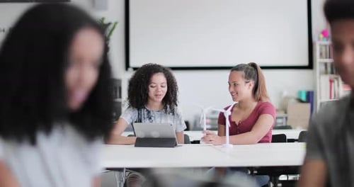 High school students studying renewable energy