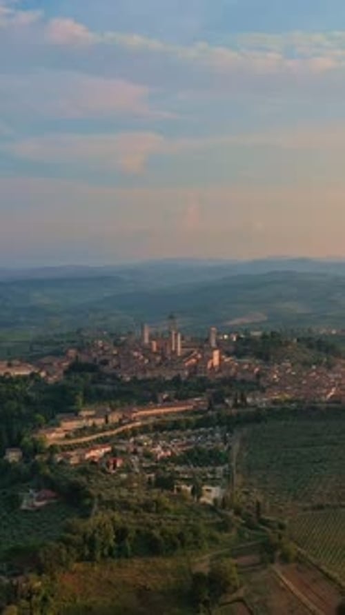 Aerial Forward Revealing Wide Shot of San Gimignano Tuscany Italy