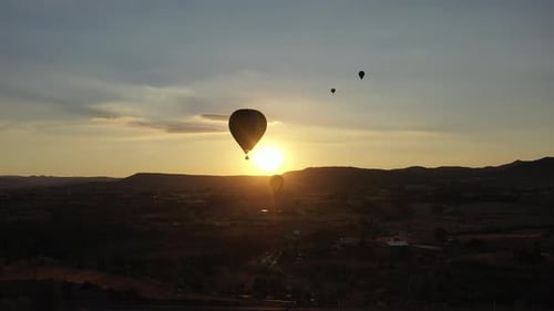 Hot Air Balloons Floating at Sunrise