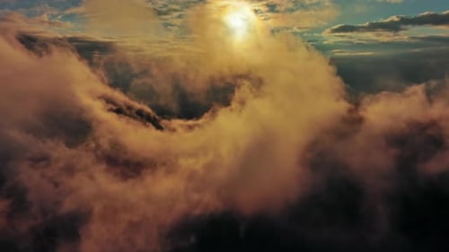 Aerial View of Orange Fluffy Cloud in Sky