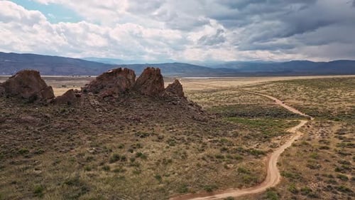Rotating aerial view of desert landscape along camping area at Flaming Gorge