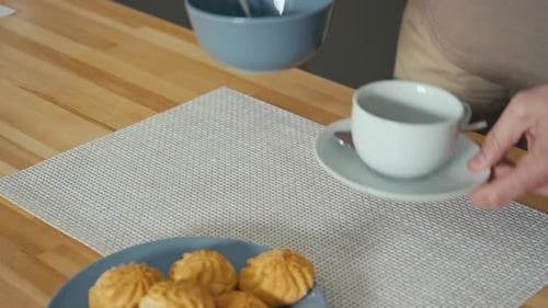 Breakfast items being setup on a table