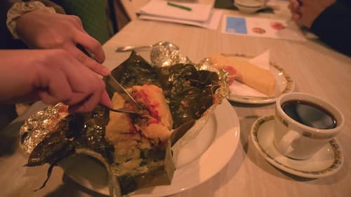 Chef Garnishing Gourmet Seafood Dish in Restaurant