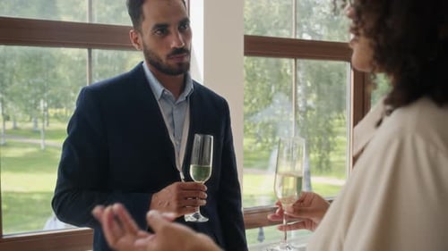 Business People Talking with Champagne at Corporate Event
