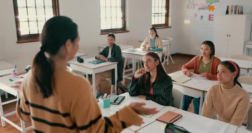Teacher Interacting with Students in a Classroom