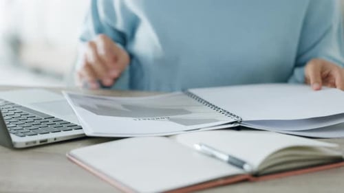 Portfolio, document and planning business woman reading or analysis of company crm marketing report