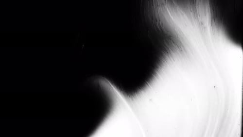 Abstract Ink Spreading on White Surface