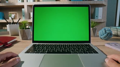 Man Looking Green Screen Laptop Video at Company Workplace Closeup Zoom in