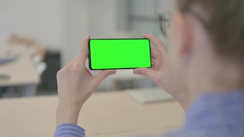 Businesswoman Holding Phone with Chroma Key Screen