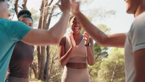 Friends Celebrating with High Fives After Workout