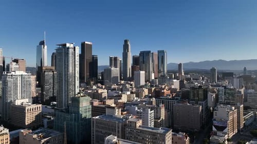 Flying into Downtown Los Angeles skyline from the South Park neighborhood. Drone Flight.