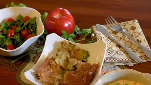 Healthy mediterranean cuisine, three dishes concept for lunch or dinner. Panning closeup of three di