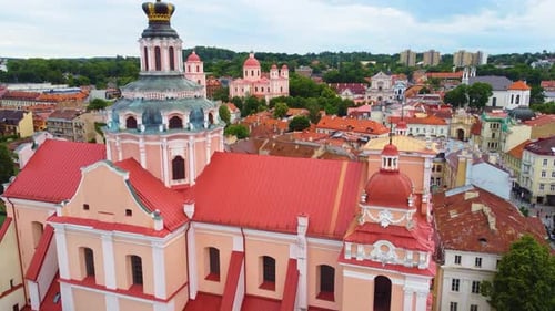 Vilnius, showcasing historical churches and colorful rooftops in summer, aerial view