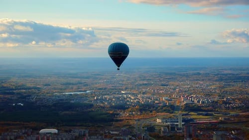 Flying Hot Air Balloon With Panoramic City Views In Vilnius, Lithuania. Aerial Wide Shot