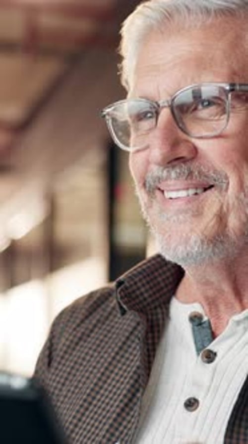 Office, mature man and thinking with tablet for reading, research and online results with smile