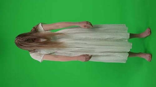 Fullsize Vertical Green Screen Chroma Key Video of a Posessed Female Woman Figure Ghost Poltergeist